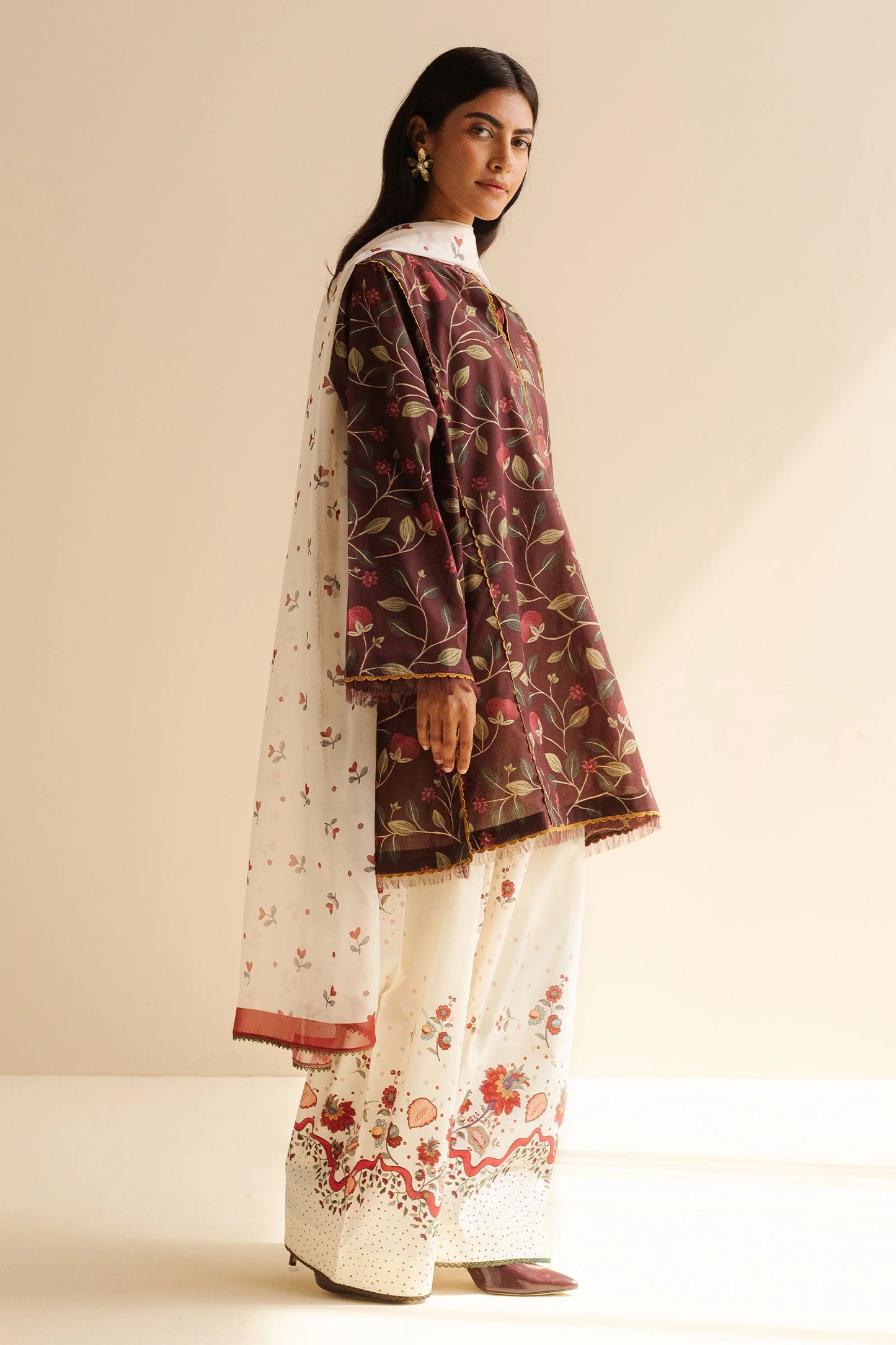 COCO BY ZARA SHAHJAHAN - 3PC UNSTITCHED - A warm, earthy brown shirt paired with crisp white pattern trousers,