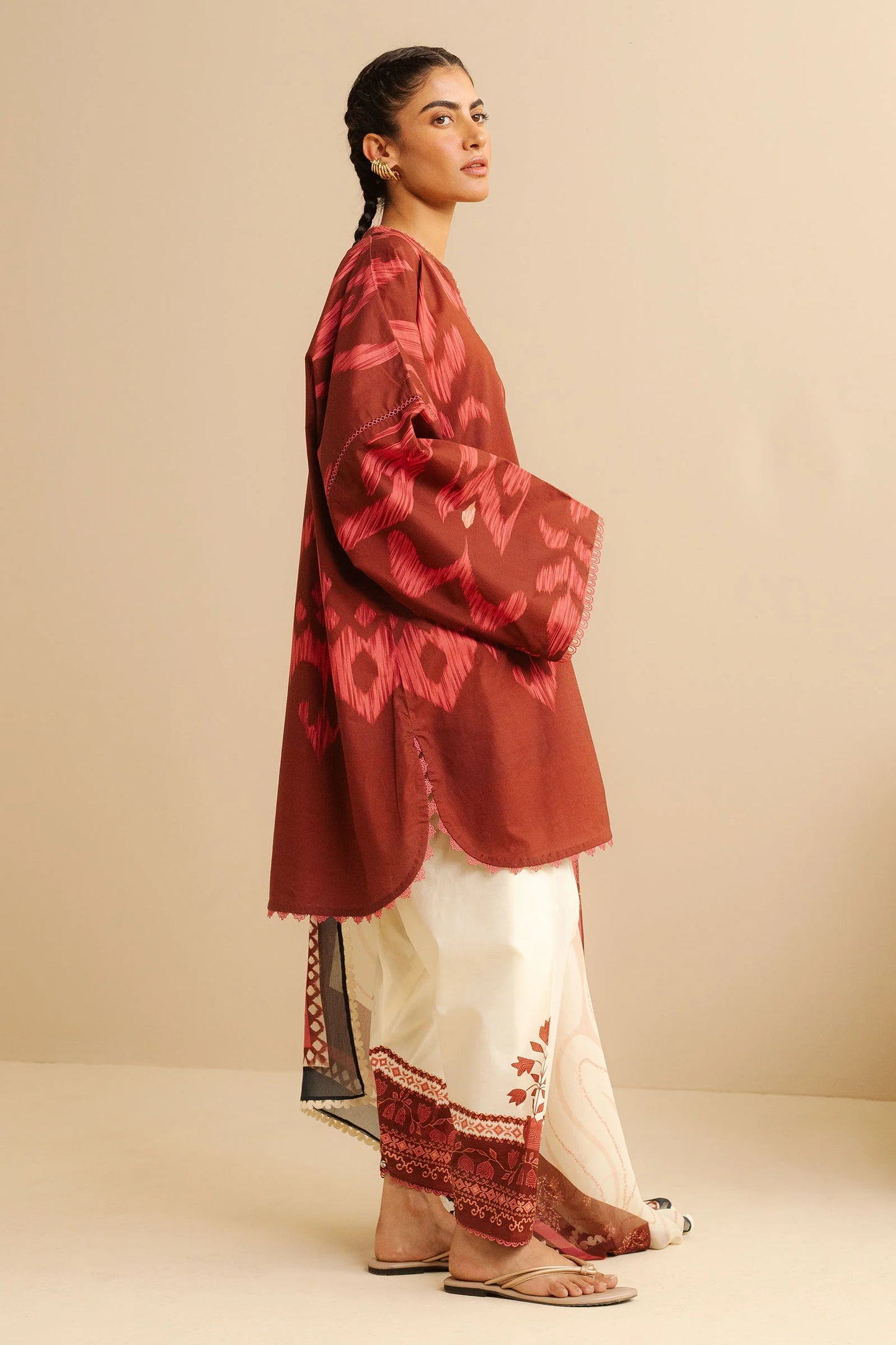 COCO BY ZARA SHAHJAHAN - 3PC UNSTITCHED - A cherry red printed shirt with a dupatta flowing gracefully, paired with white tailored trousers