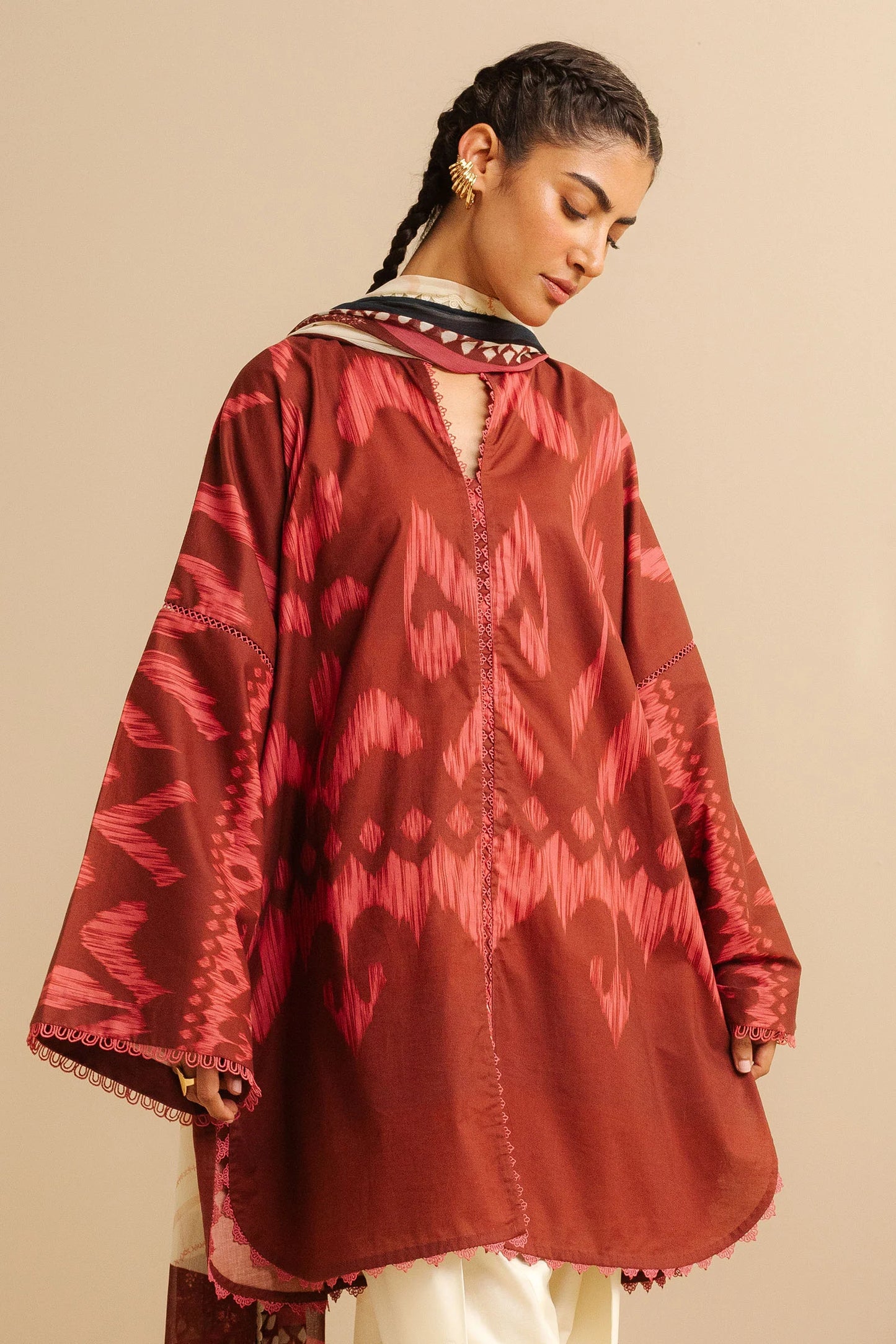 COCO BY ZARA SHAHJAHAN - 3PC UNSTITCHED - A cherry red printed shirt with a dupatta flowing gracefully, paired with white tailored trousers