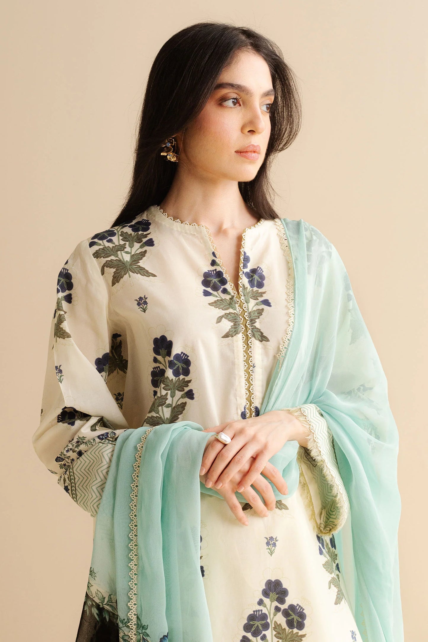 COCO BY ZARA SHAHJAHAN - 3PC UNSTITCHED - A classic white printed shirt featuring intricate prints, styled with scalloped trousers and a light blue dupatta