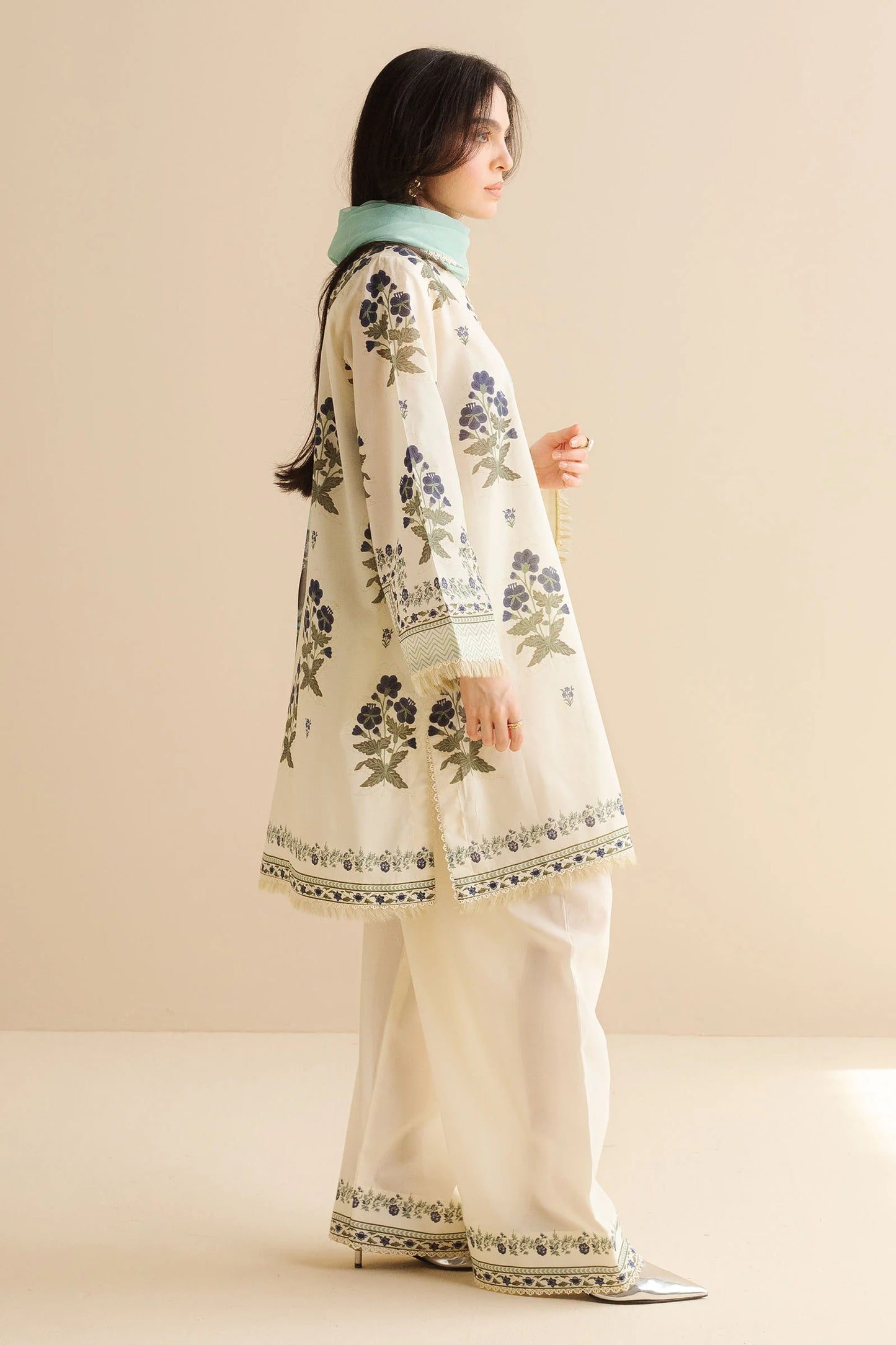 COCO BY ZARA SHAHJAHAN - 3PC UNSTITCHED - A classic white printed shirt featuring intricate prints, styled with scalloped trousers and a light blue dupatta
