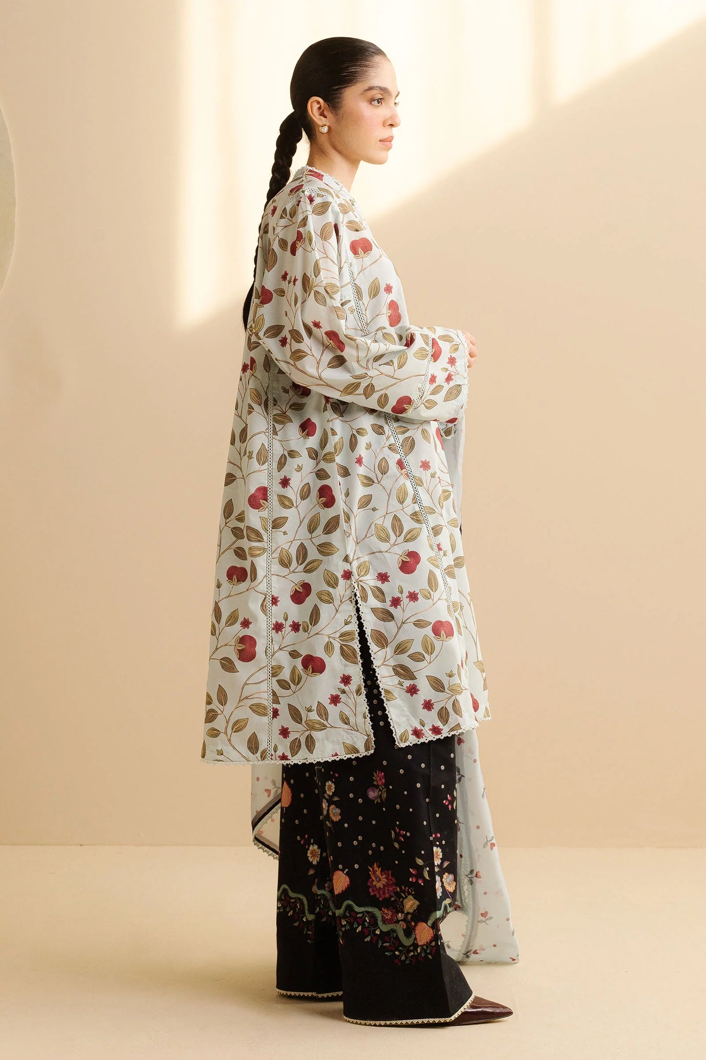 COCO BY ZARA SHAHJAHAN - 3PC UNSTITCHED - A breezy light blue and white shaded shirt adorned with red leaves and intricate patterns, paired with bold black patterned trousers and a simple white dupatta