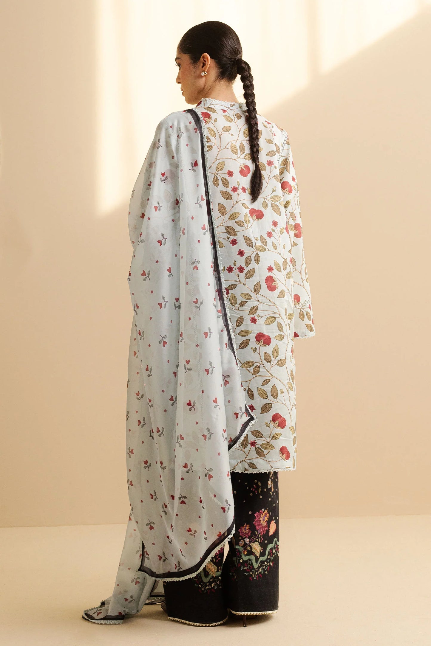 COCO BY ZARA SHAHJAHAN - 3PC UNSTITCHED - A breezy light blue and white shaded shirt adorned with red leaves and intricate patterns, paired with bold black patterned trousers and a simple white dupatta