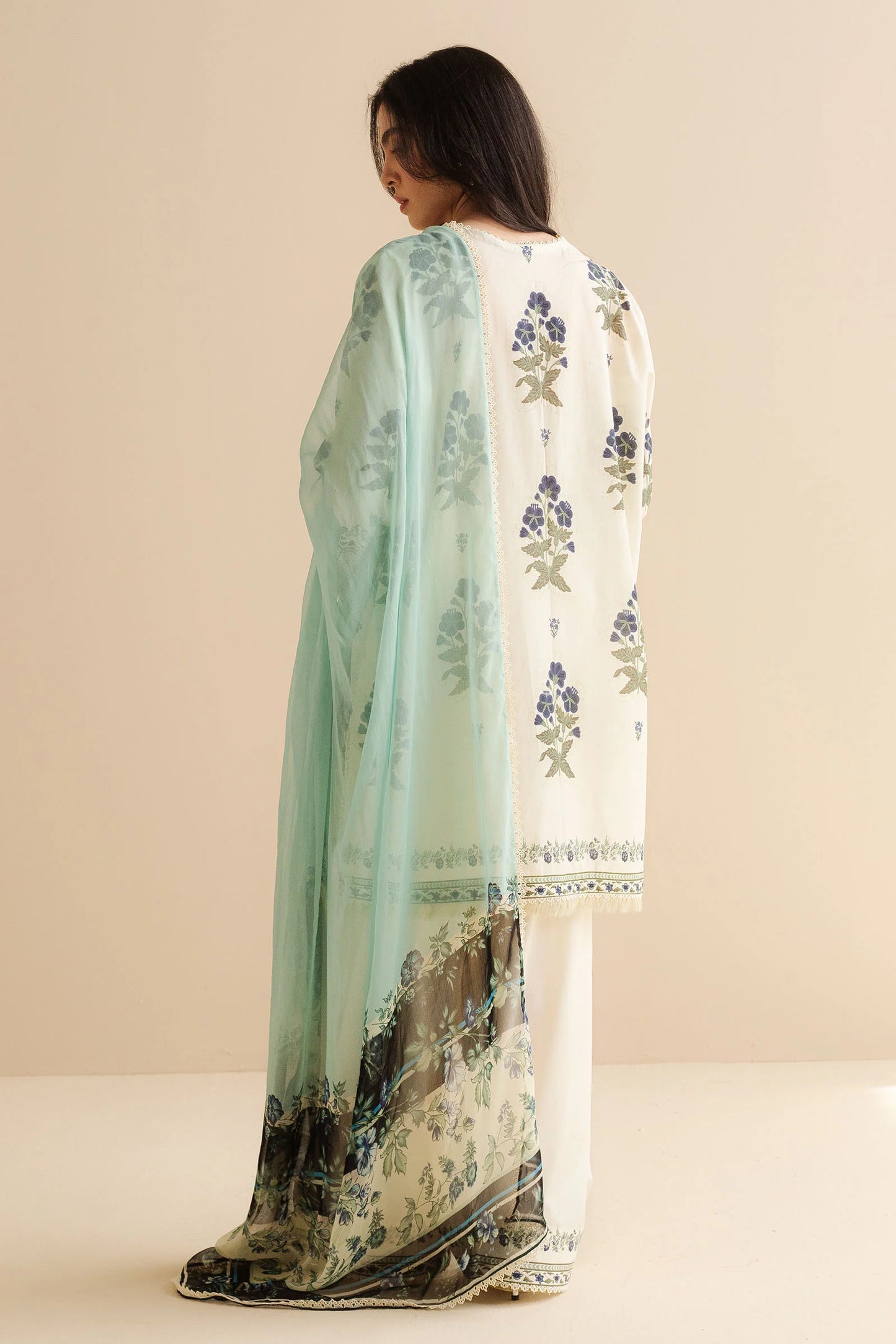 COCO BY ZARA SHAHJAHAN - 3PC UNSTITCHED - A classic white printed shirt featuring intricate prints, styled with scalloped trousers and a light blue dupatta